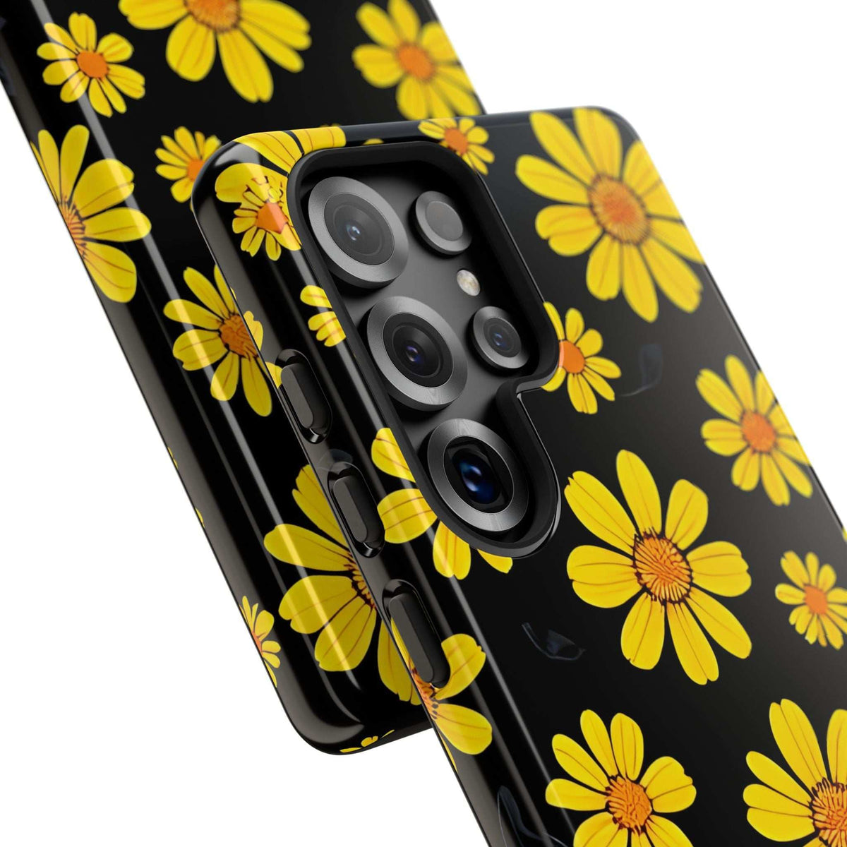 Angled black phone case with yellow daisy pattern and reinforced camera area