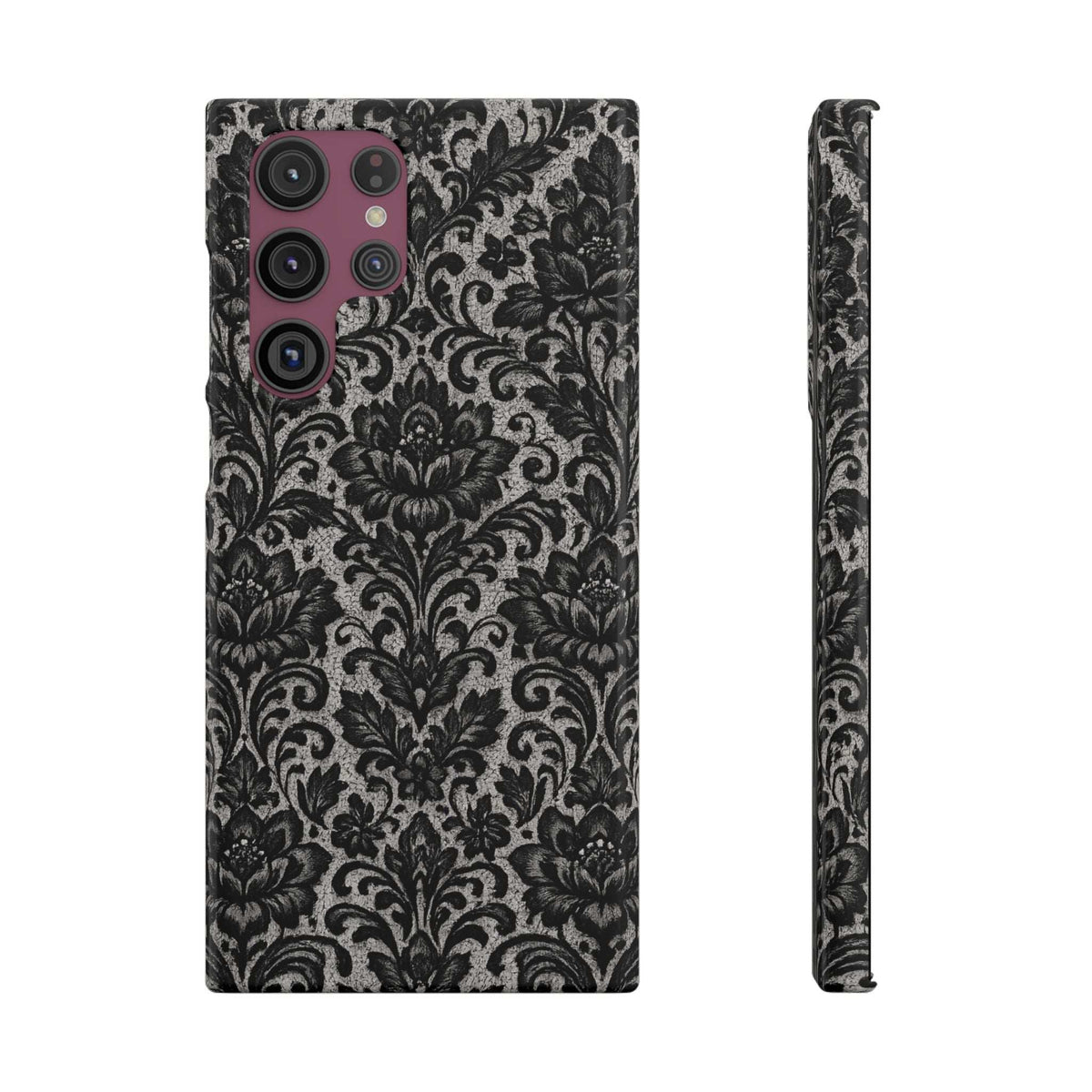 Black damask floral phone case with camera lens openings and a textured, ornate pattern