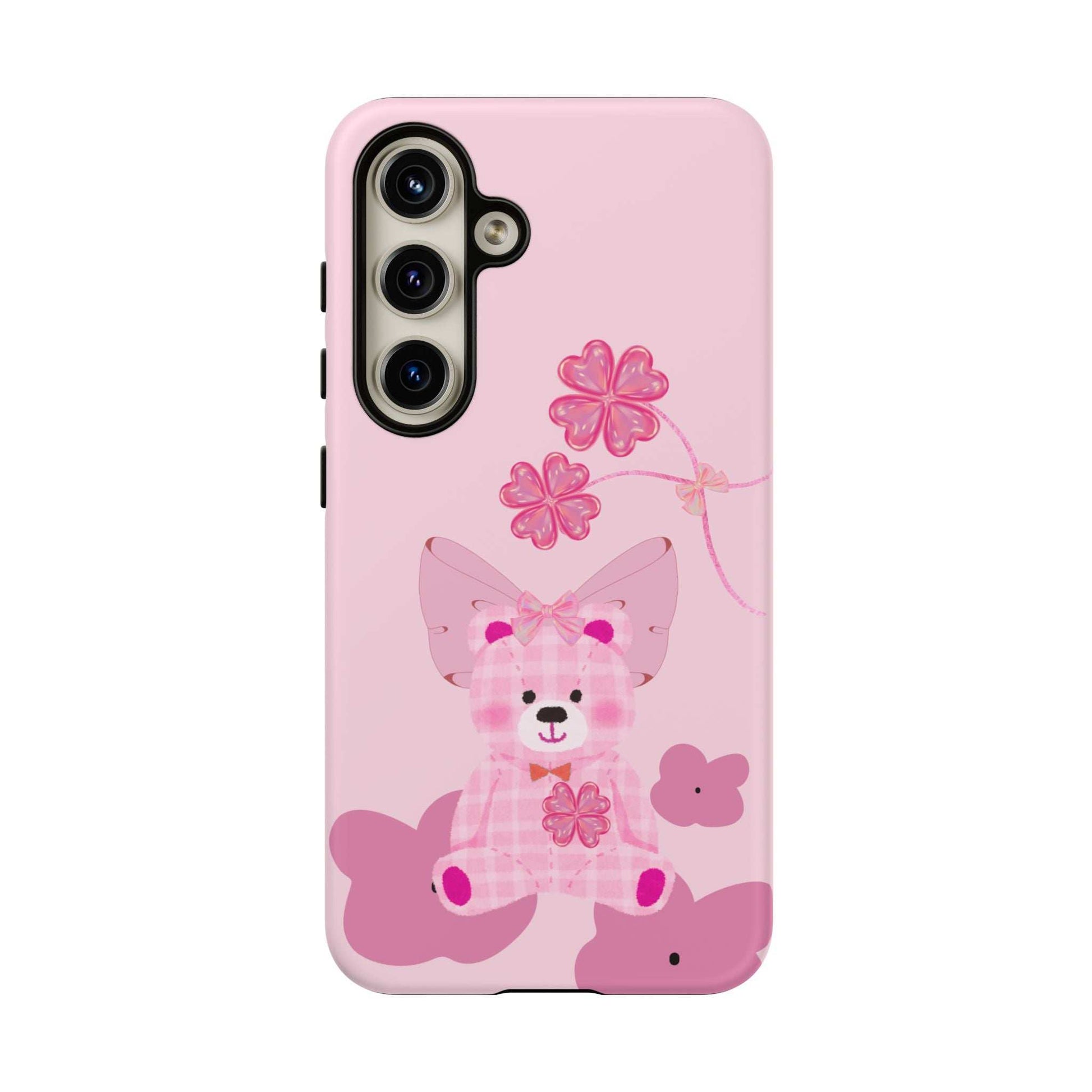 Pink phone case with teddy bear illustration and flower accents; back view