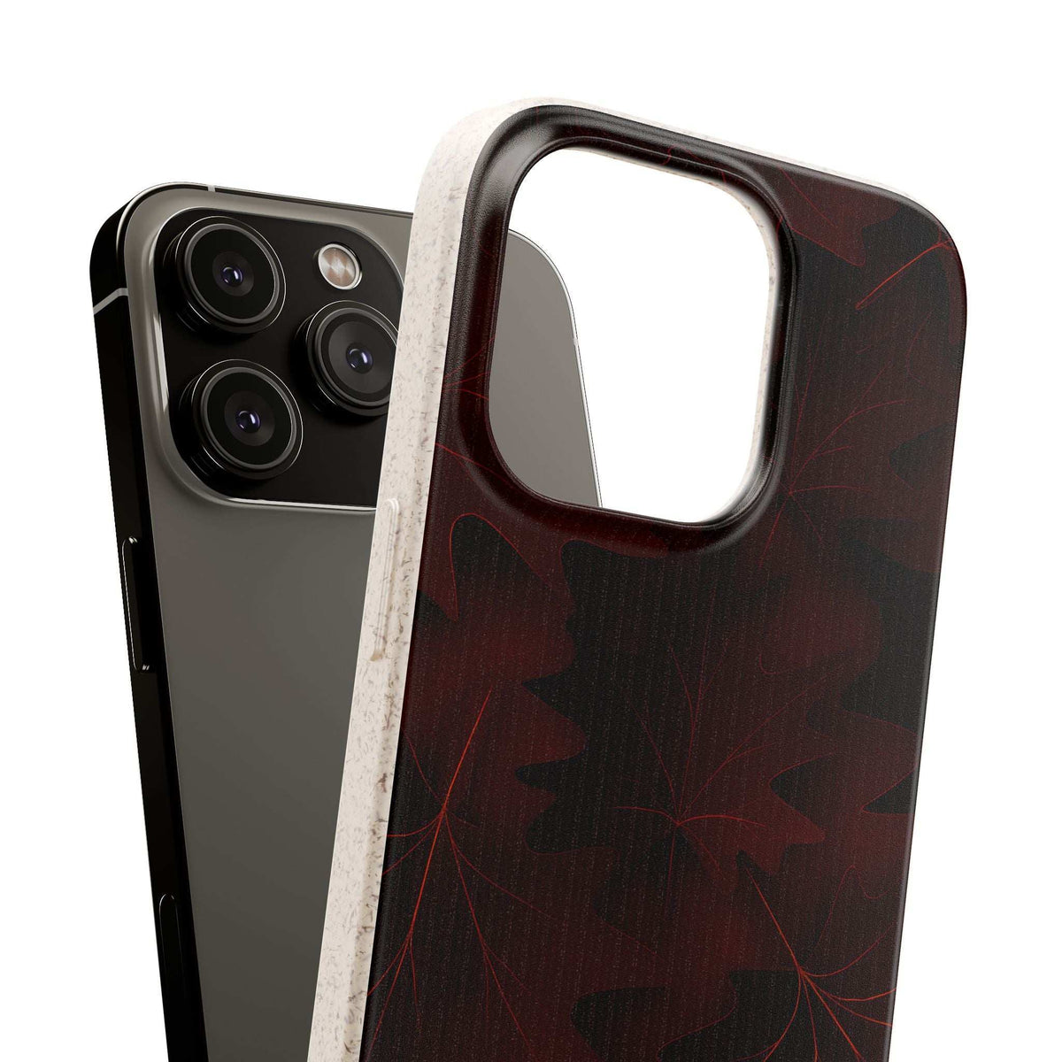 Dark leaf-pattern phone case in burgundy with thick bumper around camera opening