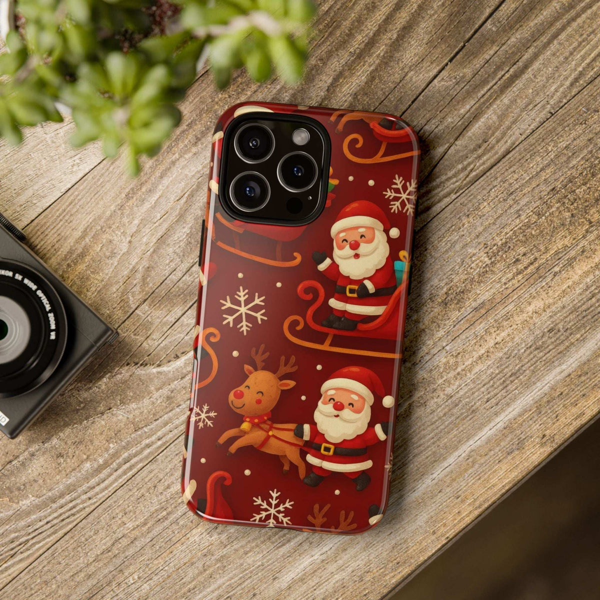 Glossy red phone case with Santa, reindeer and snowflake print, back camera cutouts