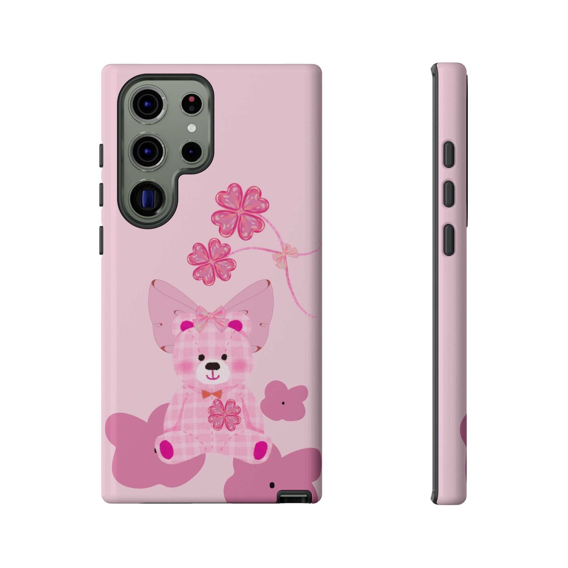 Pink teddy bear phone case with pink flower details; back and side profile shown.