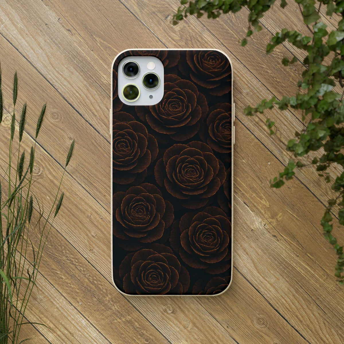 Black phone case with dark rose pattern and camera cutouts