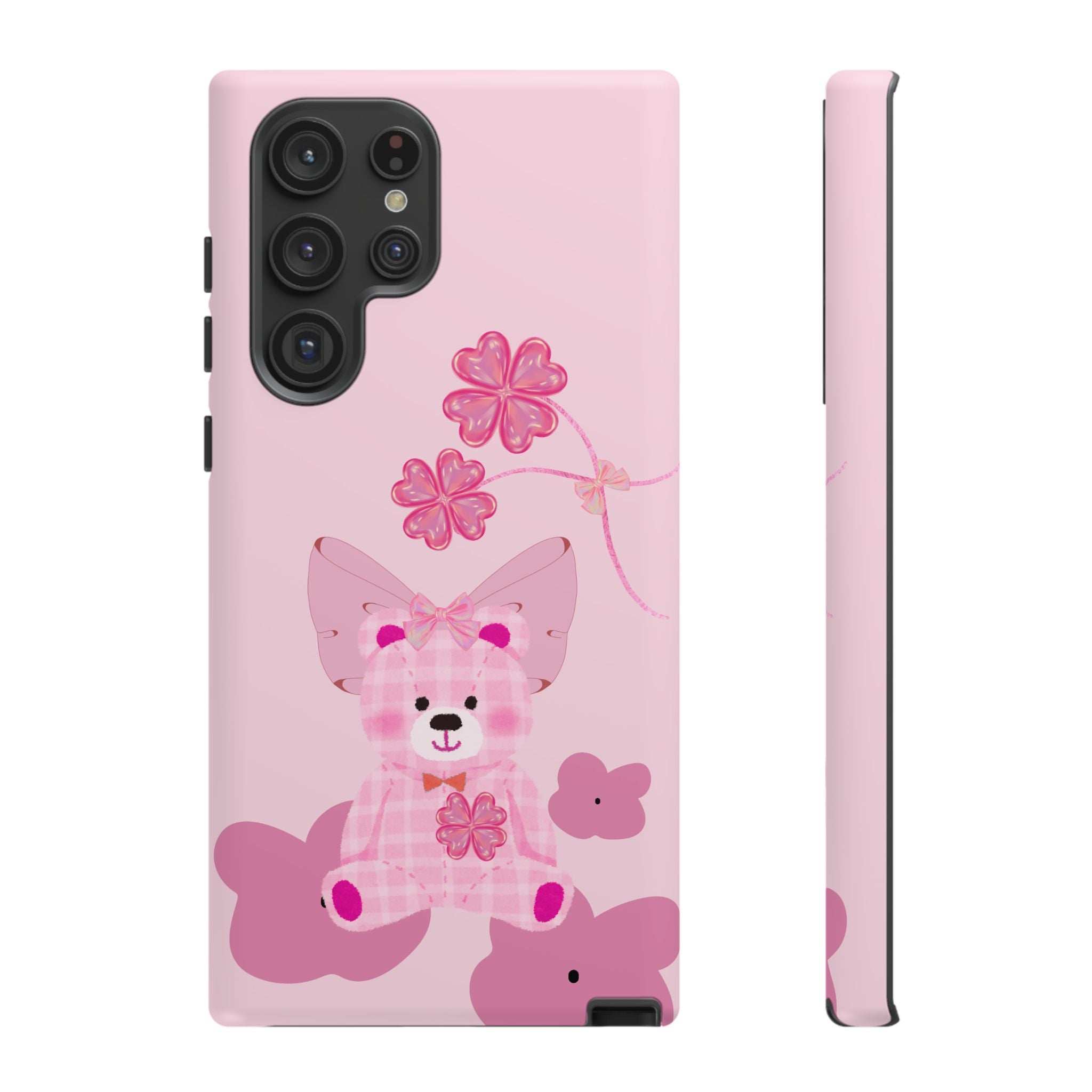 Pink phone case with teddy bear and flower graphic, back and side edge view