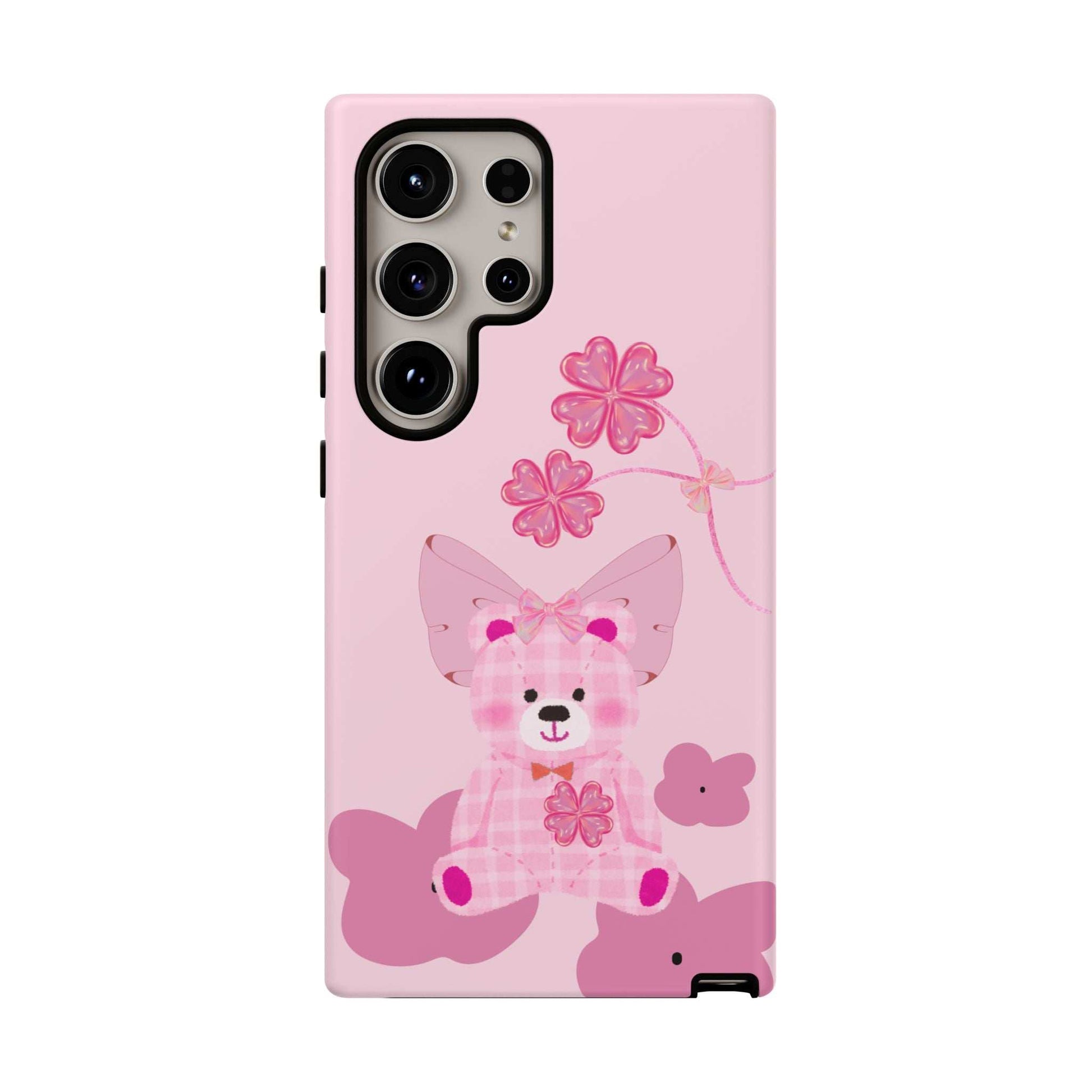 Pink phone case featuring teddy bear and pink flowers; back and side profile.