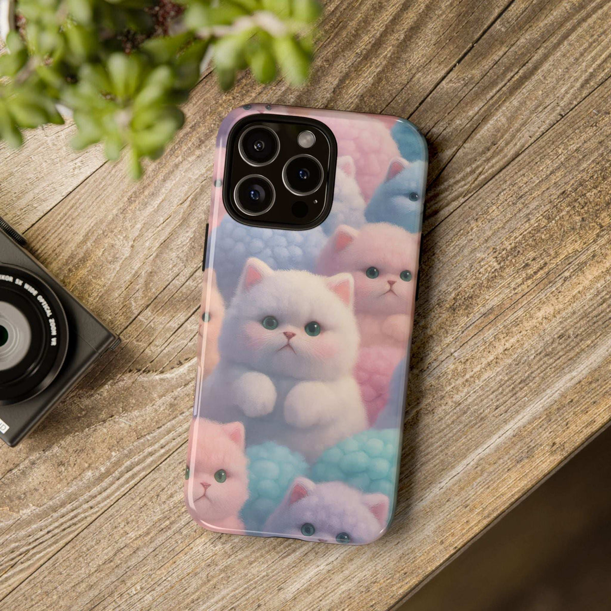 Glossy pastel kitten phone case with cat faces, rounded corners, and lens cutouts